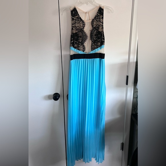 Homecoming dress. Light and airy blue dress. - Picture 2 of 3